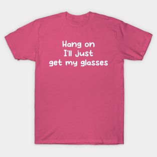 Hang on I'll just get my glasses T-Shirt